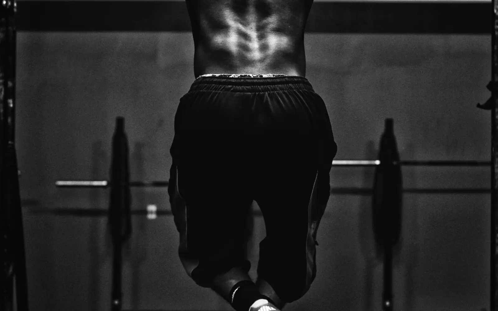 Athlete training with a pull-up bar during a KORE fitness challenge